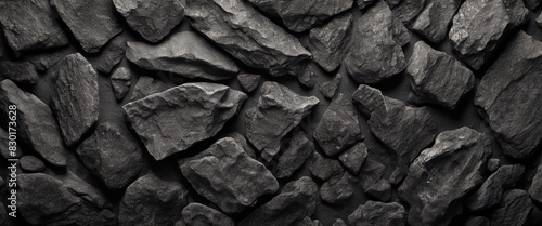 Black or dark gray rough grainy stone texture back.
