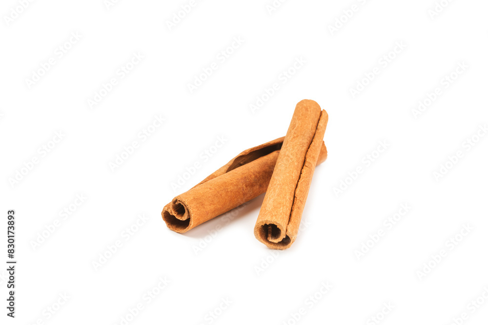 Cinnamon sticks isolated on white background. Cinnamon roll. Spicy spice for baking, desserts and drinks. Fragrant ground cinnamon. Cinnamon sticks isolated on white background. Cinnamon roll. Spicy spice for baking, desserts and drinks. Fragrant ground cinnamon.