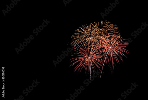 Firework celebration 2025 Happy New Year or American National Day anniversary party in dark night background. Beautiful Fireworks Concept.