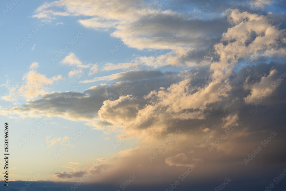 Fototapeta premium Beautiful red and blue clouds in the evening. A beautiful sunset with clouds.