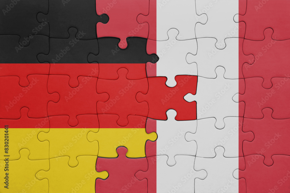 puzzle with the colourful national flag of peru and flag of germany. puzzle with the colourful national flag of peru and flag of germany.