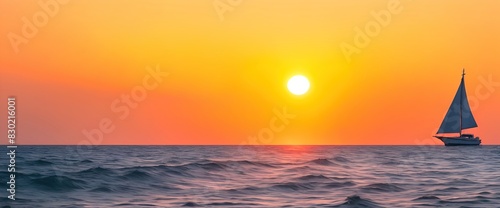 Sailboat in the sea during sunset