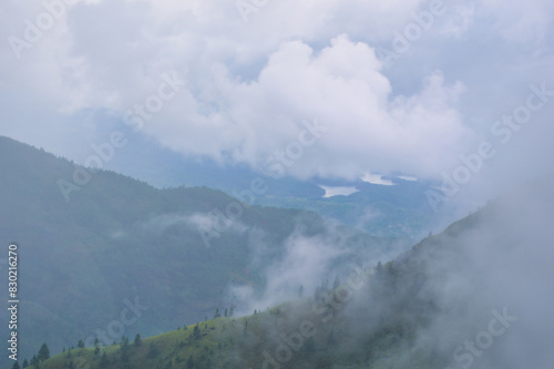  View from Baker's Bend, Clouds Touching Mountain Top,Cool Autumn Vibes, Nonpareil Mountain, Belihuloya, Sri Lanka

 photo