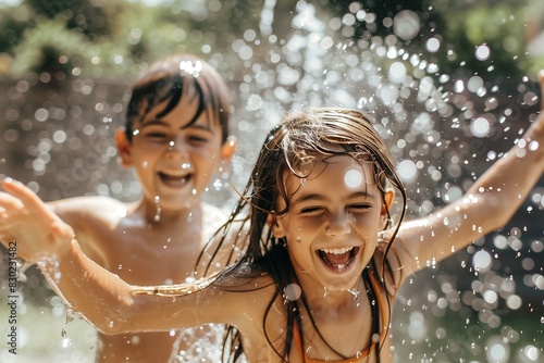 Joyful Kids Playing with Water Sprinkler on a Sunny Summer Day
