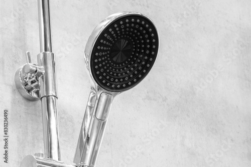 Wallpaper Mural A shower head with a black nozzle is attached to a metal rod Torontodigital.ca