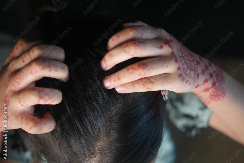 Obraz premium little girl Scratching her Head