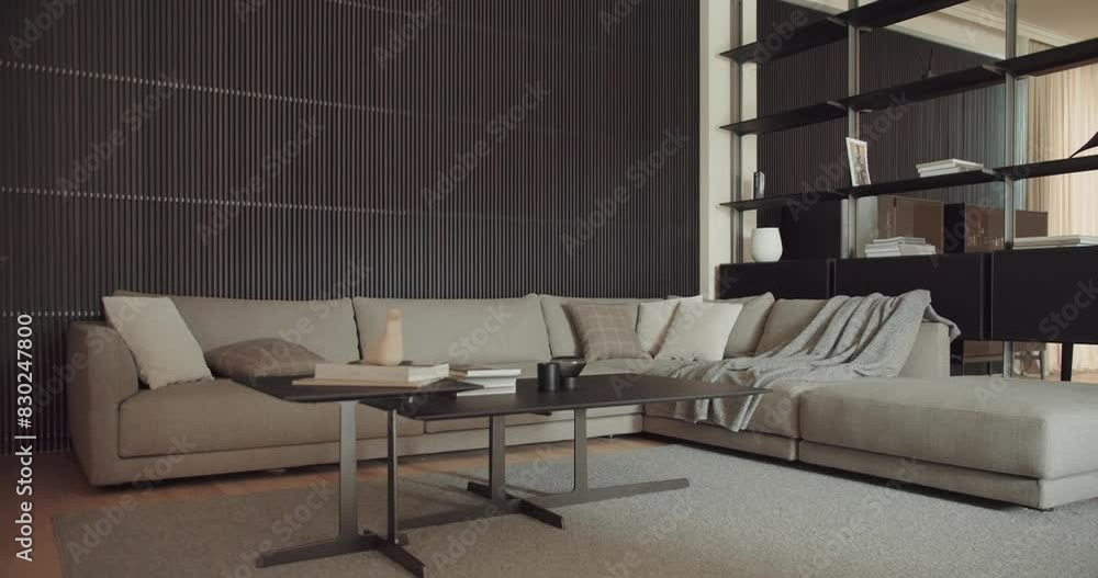 A sophisticated and cozy modern living room featuring a large sofa ...