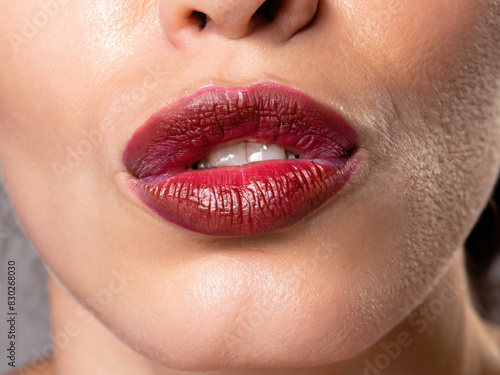 lips of a woman giving a kiss, perfect lips, glamour makeup, closeup on lipstick