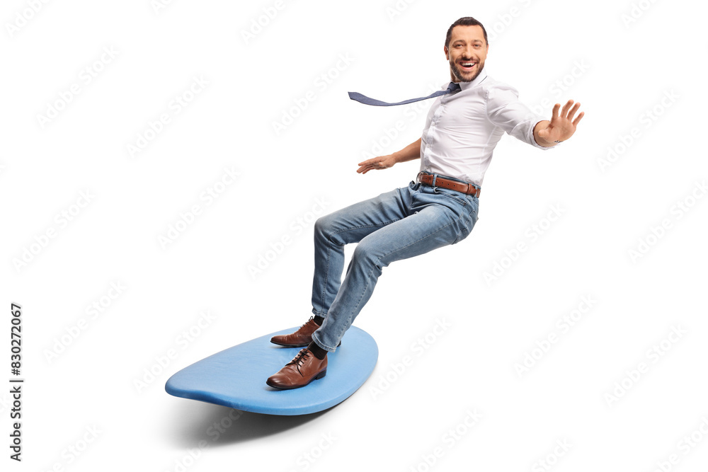 Happy businessman riding a surfboard Happy businessman riding a surfboard