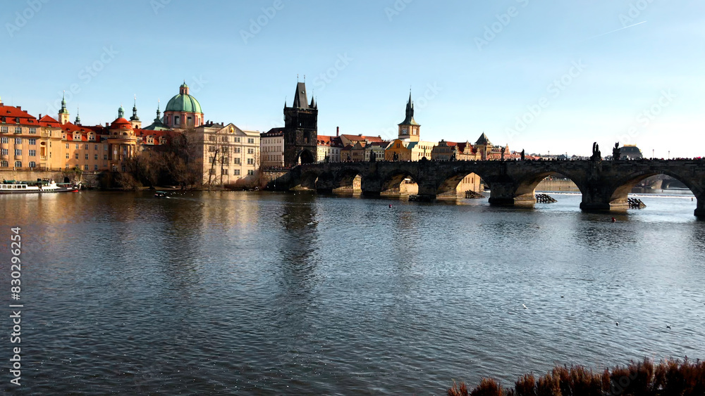 Fototapeta premium Prague city, river vltava and bridge. Media. Beautiful old architecture of the ancient city.
