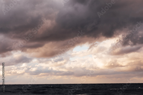 Beautiful landscape storm on sea and sunset with clouds