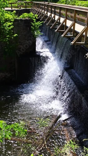 Beautiful Creek Aqueduct waterfall at Delaware Canal trail in Lambertville New Jersey photo