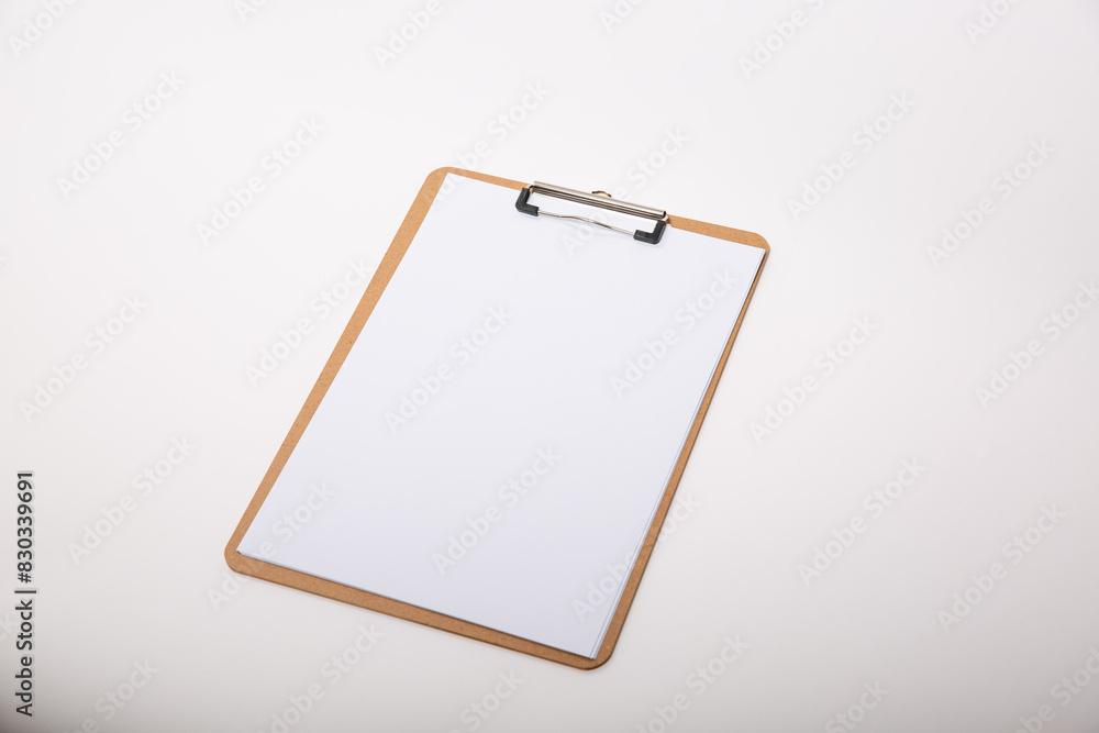 Wooden clipboard with blank white paper mock up Wooden clipboard with blank white paper mock up