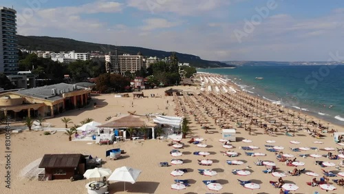 Aerial view of the beach and hotels in Golden Sands, Zlatni Piasaci. Popular summer resort near Varna, Bulgaria. Drone view from above. Summer holidays destination
 photo