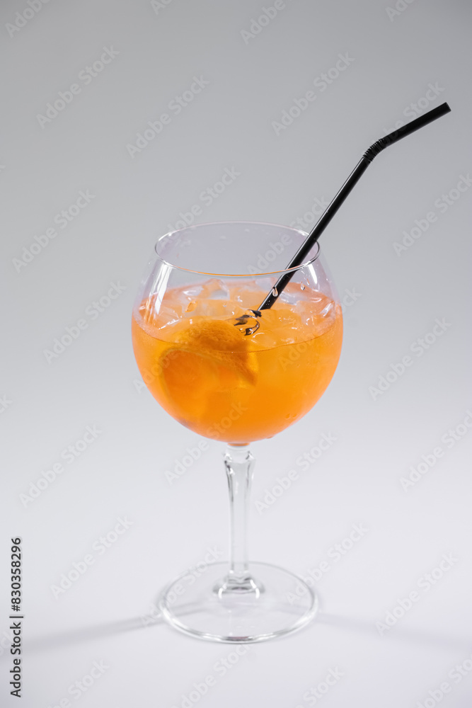 orange aperol spritz cold cocktail with ice in glass isolated on white background orange aperol spritz cold cocktail with ice in glass isolated on white background