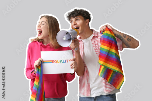 Young couple with LGBT flag...