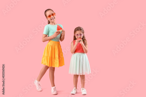 Happy little girls with sli...