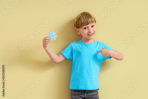 Cute little boy pointing at...