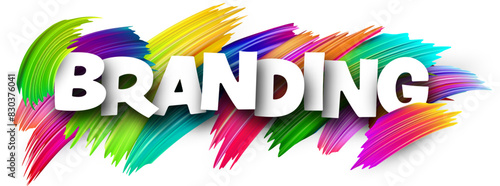 Branding paper word sign with colorful spectrum paint brush strokes over white.