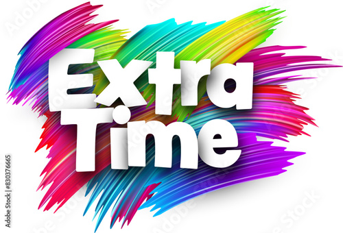 Extra time paper word sign with colorful spectrum paint brush strokes over white.