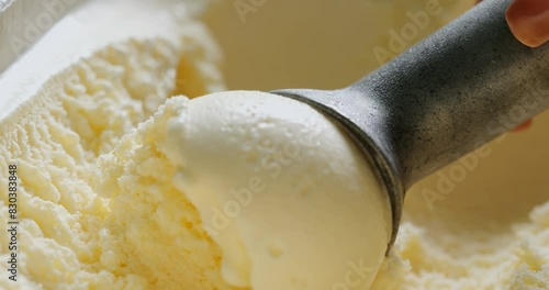 4K footage Close-up Front view, Scoop out vanilla-flavored ice cream.
