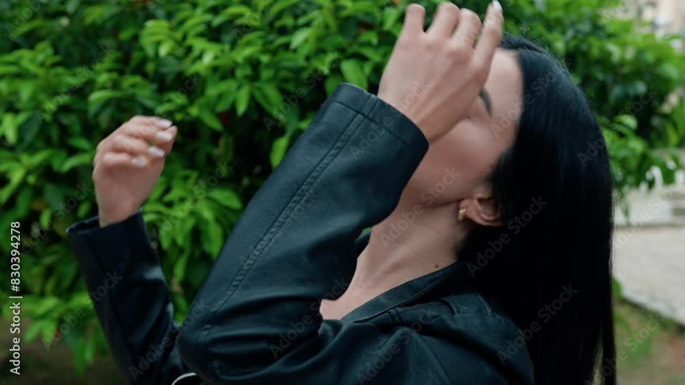 Woman Touching Her Hair In The Nature Woman Touching Her Hair In The Nature