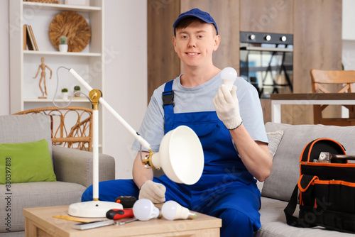 Male technician with light ...