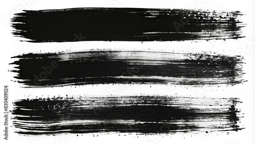 Grunge brush strokes and banners with black ink, perfect for design projects photo