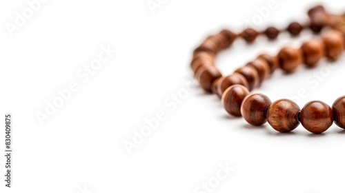 Closeup of tasbih or rosary on a white background. Selective focus and copy space. 
