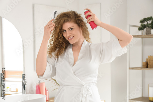 Young woman with brush appl...