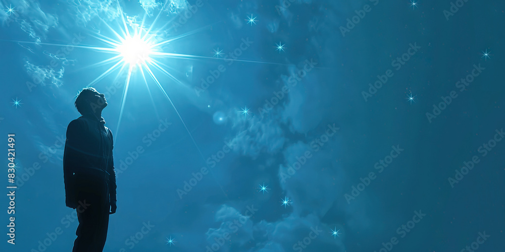 Fototapeta premium Hope (Light Blue): A figure looking up at a bright star, symbolizing hope and inspiration