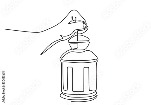 Hand hold lantern in one continuous single line art drawing style. Ramadan kareem concept.