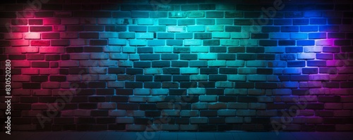 Brick wall illuminated with neon lights in blue  purple and pink.