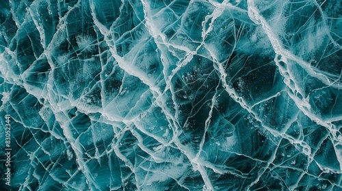  A close-up of ice crystals on a body of water's surface The water's surface is covered in these transparent, frozen formations © Mikus