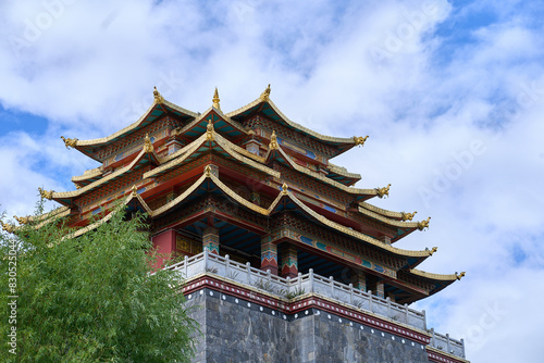 a traditional sino-tibetan style wooden palace on stone base