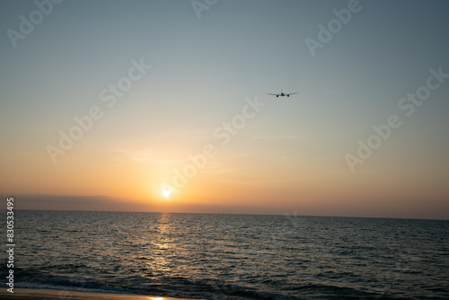 Passenger jet airplane take off from an airport in the evening.