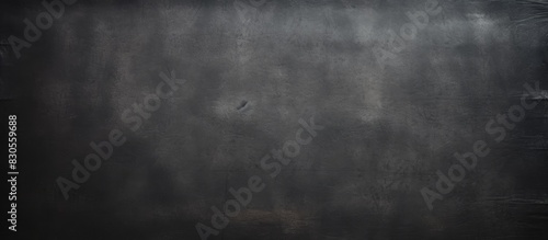 A vintage black paper with ample empty space for adding desired content is available for use