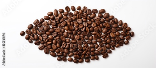 A top down view of a sun made of roasted coffee beans against a white backdrop providing copy space for your messages