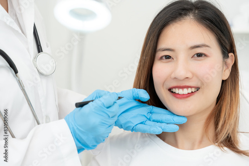 plastic surgery, beauty, Surgeon or beautician touching woman face, surgical procedure that involve altering shape of face, doctor examines patient face, medical assistance, health.