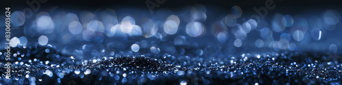 Abstract Blue Bokeh Background with Glittering Silver Sparkles