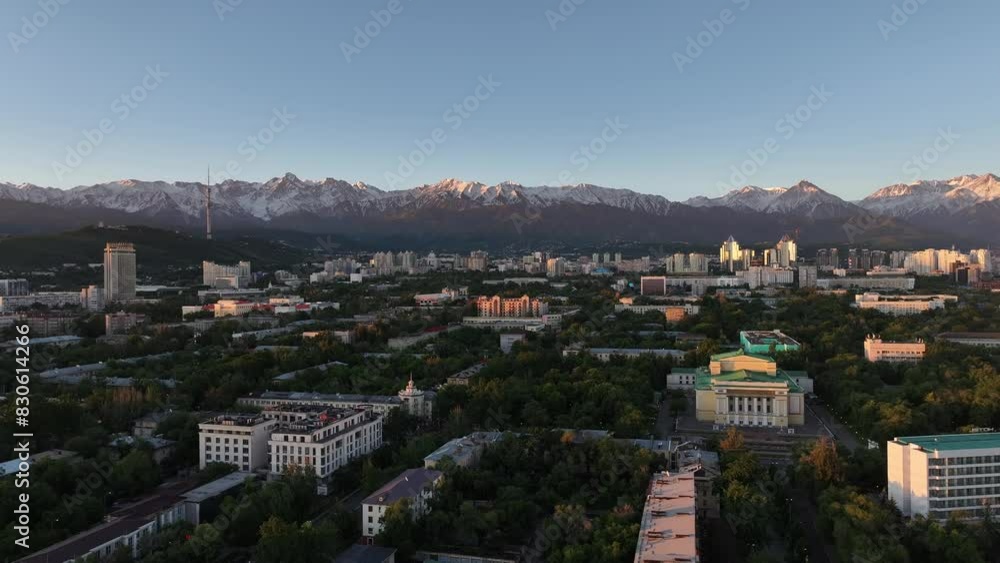 View from a quadcopter of the central part of the Kazakh city of Almaty on a spring morning against the backdrop of a mountain range View from a quadcopter of the central part of the Kazakh city of Almaty on a spring morning against the backdrop of a mountain range