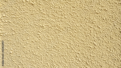 Close up plain cream color cement wall texture background