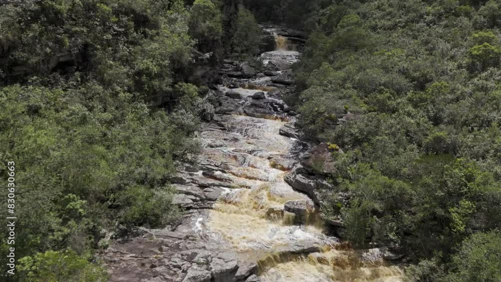 Drone follows raging river upstream in canyon Drone follows raging river upstream in canyon