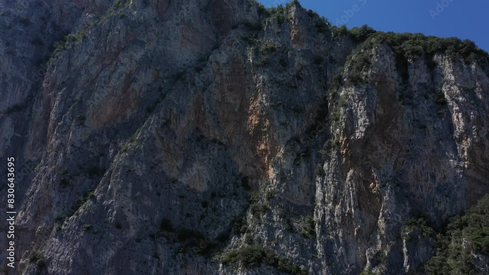 Slow flight on a drone near a rock. aerial video of the breathtaking landscape of Garda in 4K. Aerial view of a rock on Lake Garda, Italy. Slow flight on a drone near a rock. aerial video of the breathtaking landscape of Garda in 4K. Aerial view of a rock on Lake Garda, Italy.