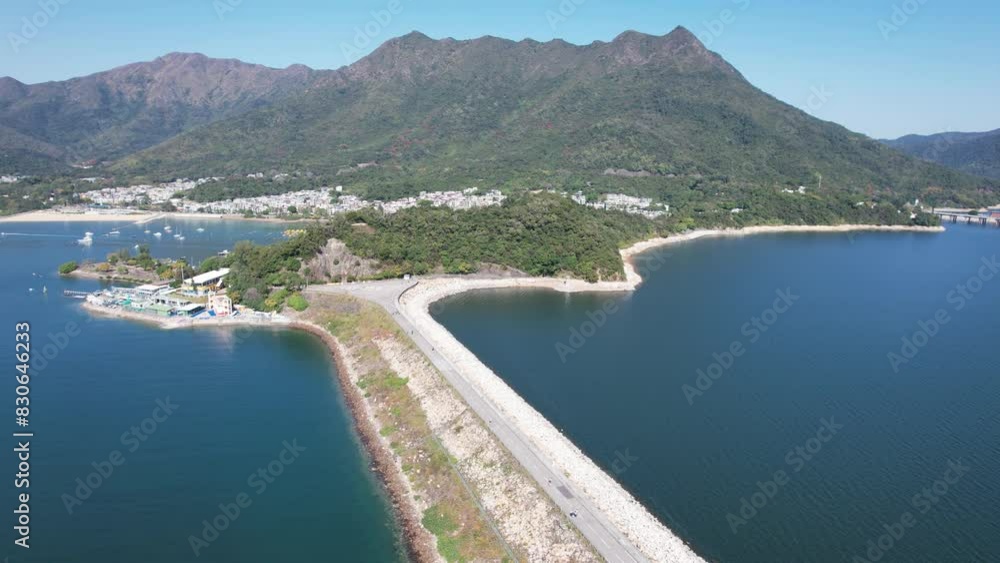 Aerial journey over Hong Kong Tai Po Tai Mei Tuk, Pat Sin Leng Country Park,Plover Cove Reservoir Dam, and Long Mei Beach, a natural playground for hiking, fishing, cycling,water sports