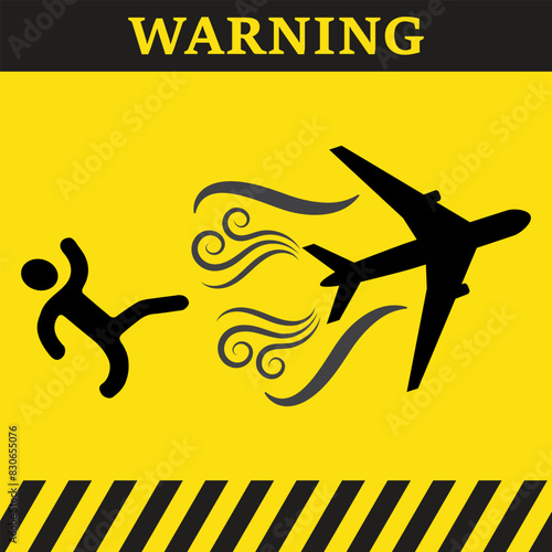 Warning symbol on yellow background with silhouette of a person and a plane 