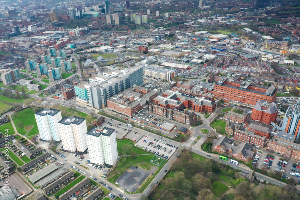 Aerial photo take in the town of Harehills in Leeds just outside the city centre, showing the St James's University Hospital known as Jimmy's with traffic and ambulances parked up at A and E entrance