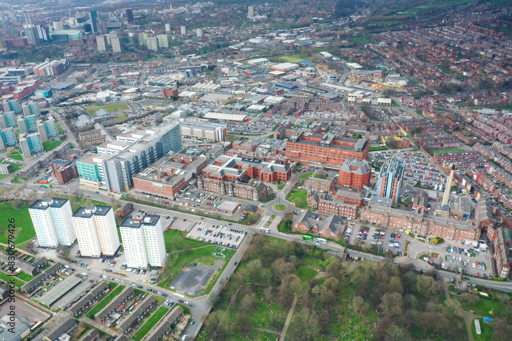 Naklejka premium Aerial photo take in the town of Harehills in Leeds just outside the city centre, showing the St James's University Hospital known as Jimmy's with traffic and ambulances parked up at A and E entrance