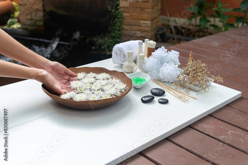 Spa massage compress balls, herbal ball on the wooden with treaments spa , Thailand photo