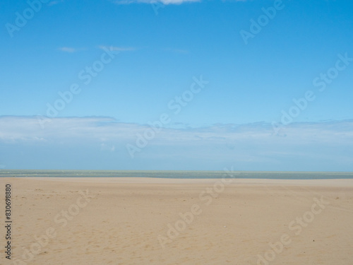 Zeeland, Netherlands - August 1st 2023: Big beach under the blue sky at the Dutch coast